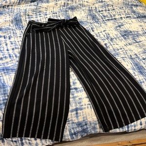 Super cute and stretchy wide legged crop dress pants.